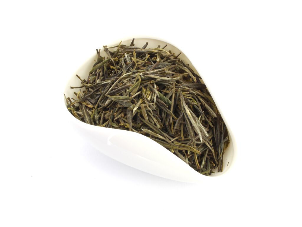 Yellow Tea 黄茶 Yellow tea (huang ya) steeping in a white porcelain gaiwan